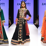 A vibrant fashion show scene, models of diverse backgrounds showcasing clothing made from recycled materials, incorporating traditional Urdu embroidery patterns (like *Zardozi*) onto modern silhouettes. Focus on sustainable fashion with a cultural twist.